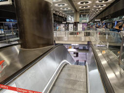Looking down the escalators to the Bakerloo line from the Elizabeth line platforms