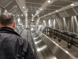 Escalators and stairs up to the Bakerloo line platforms from the tunnel to the Elizabeth line