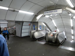 Coming from the Northern line heading to the Central line, we find escalators back down to the Northern line and also up to the way out (far left)