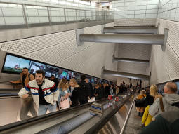 Looking down the escalators to the Elizabeth line from the Underground ticket hall