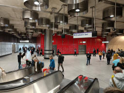At the bottom of the escalators up to the Underground ticket hall from the Elizabeth line