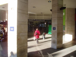 Secondary entrance from the Centre Court Shopping Centre, leading straight onto the concourse. The Tramlink platform is accessed via the first stairs down on the right, the District line is at the other end (December 2008)