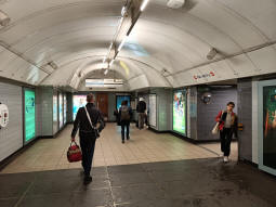 At the top of the escalators from the Northern line Bank branch and Victoria line northbound platforms