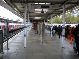 The westbound platforms from the top of the stairs down to the ticket hall